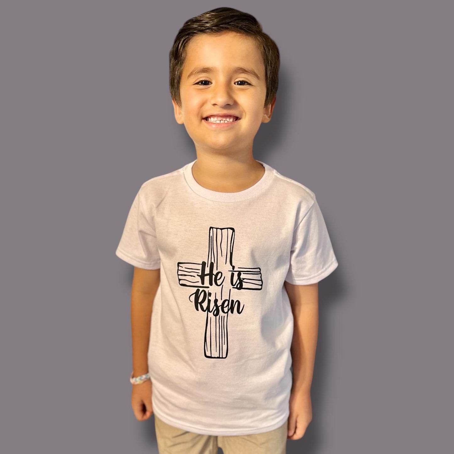 "He is Risen" on Wooden Cross kids Christian Tshirt in Black or White