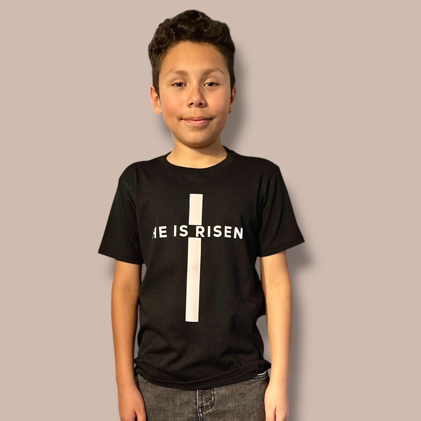 "He is Risen" on Cross kids Christian T-shirt in Black or White